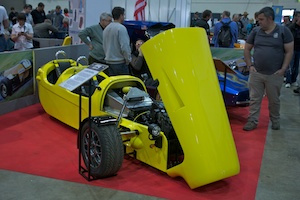 well it is 3 wheeled, two inline seats and looks bonkers